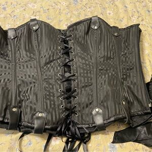 Black pirate style corset top with side zipper and front and back lacing